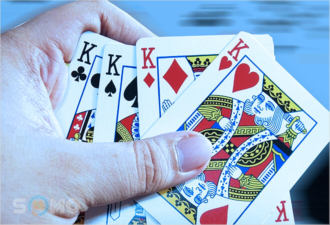 mơ thấy bài có tứ quý